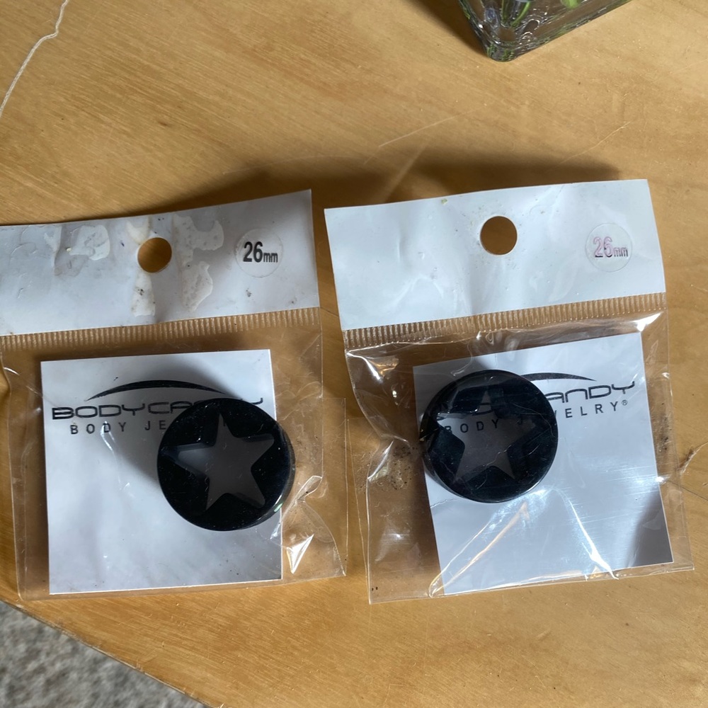 26mm star cutout plugs brand new not opened